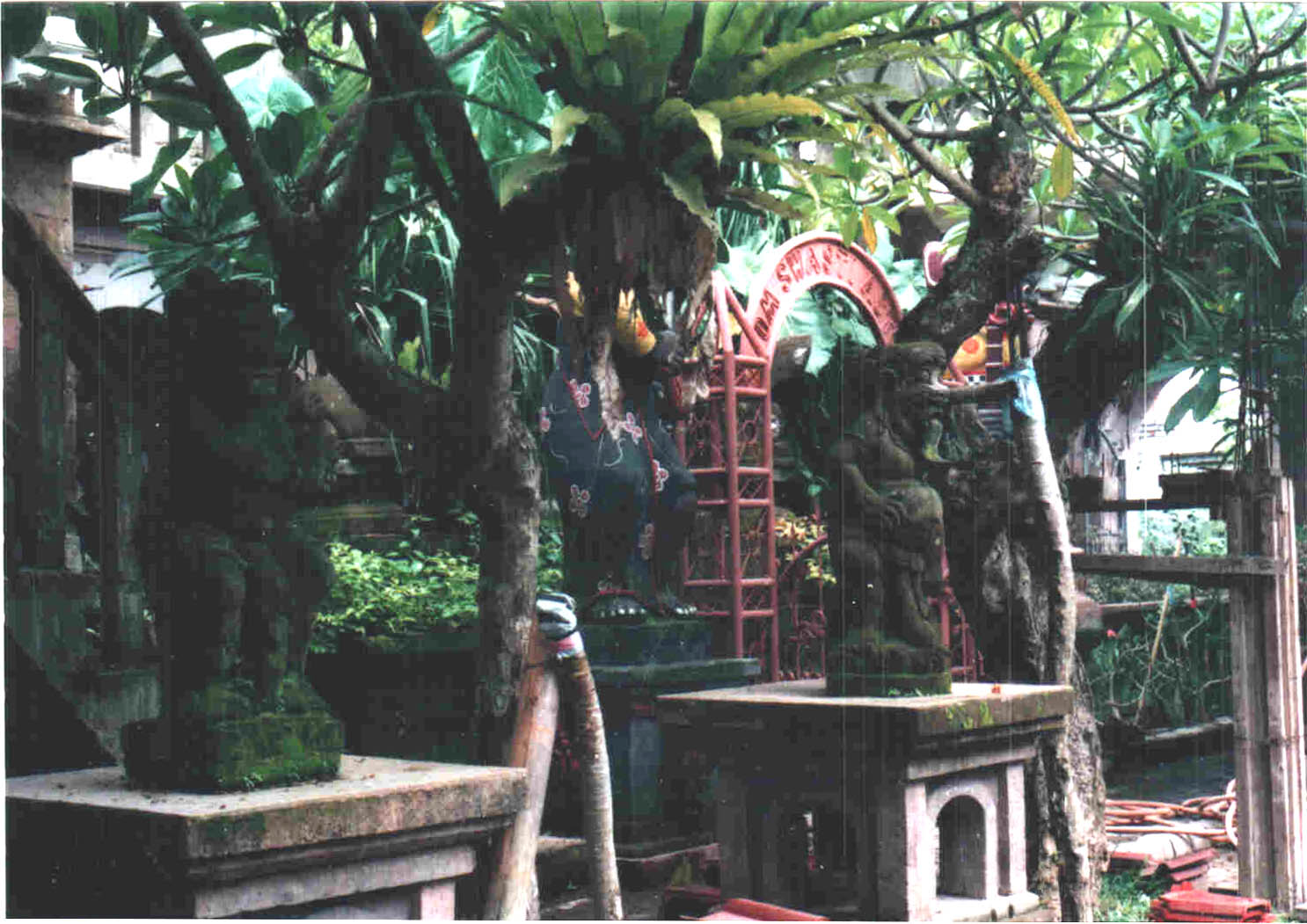 A backyard in Samur, Bali, showing typical private altar/temple setup